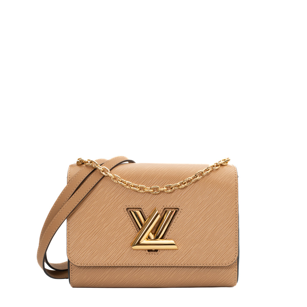 Twist MM bag in beige epi leather Louis Vuitton - Second Hand / Used –  Vintega