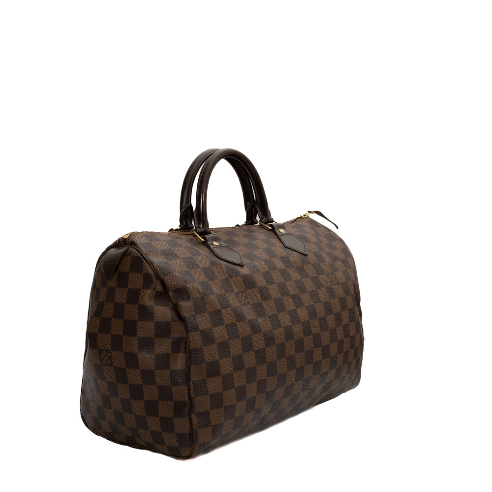 Louis Vuitton Pre Owned Monogram Canvas Speedy 35 Bag, $786, Bluefly