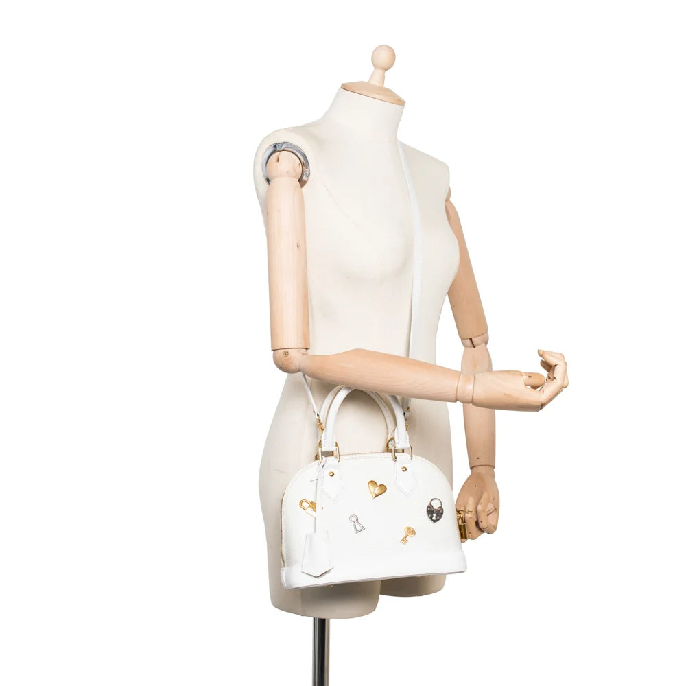 Alma BB Limited Edition bag in white epi leather Louis Vuitton Second Hand Used Vintega