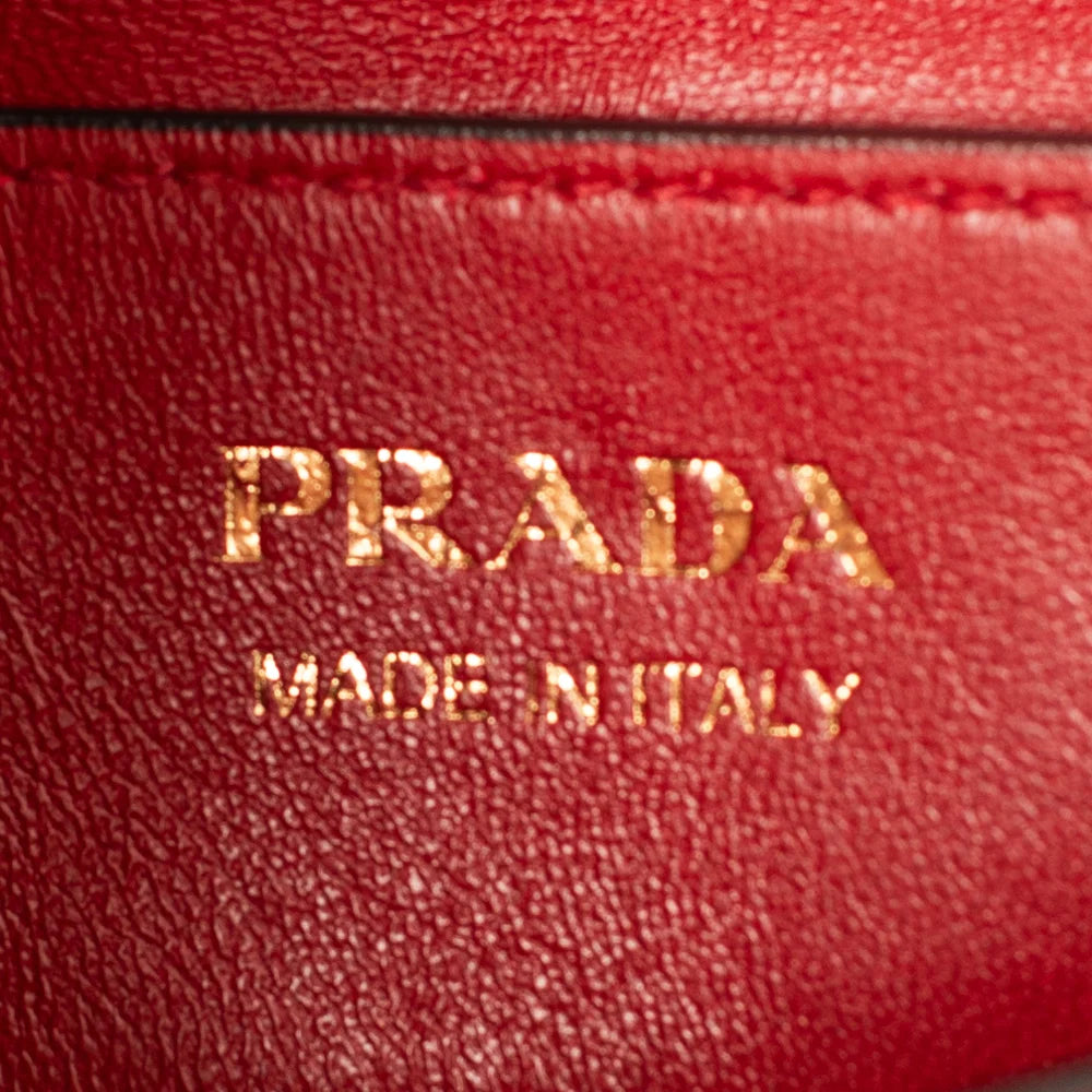 Sold at Auction: Prada Bauletto red pebbled leather bag