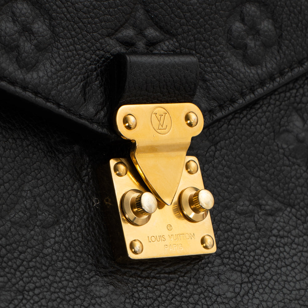 Pochette Métis bag in black imprint leather Louis Vuitton - Second Hand /  Used – Vintega