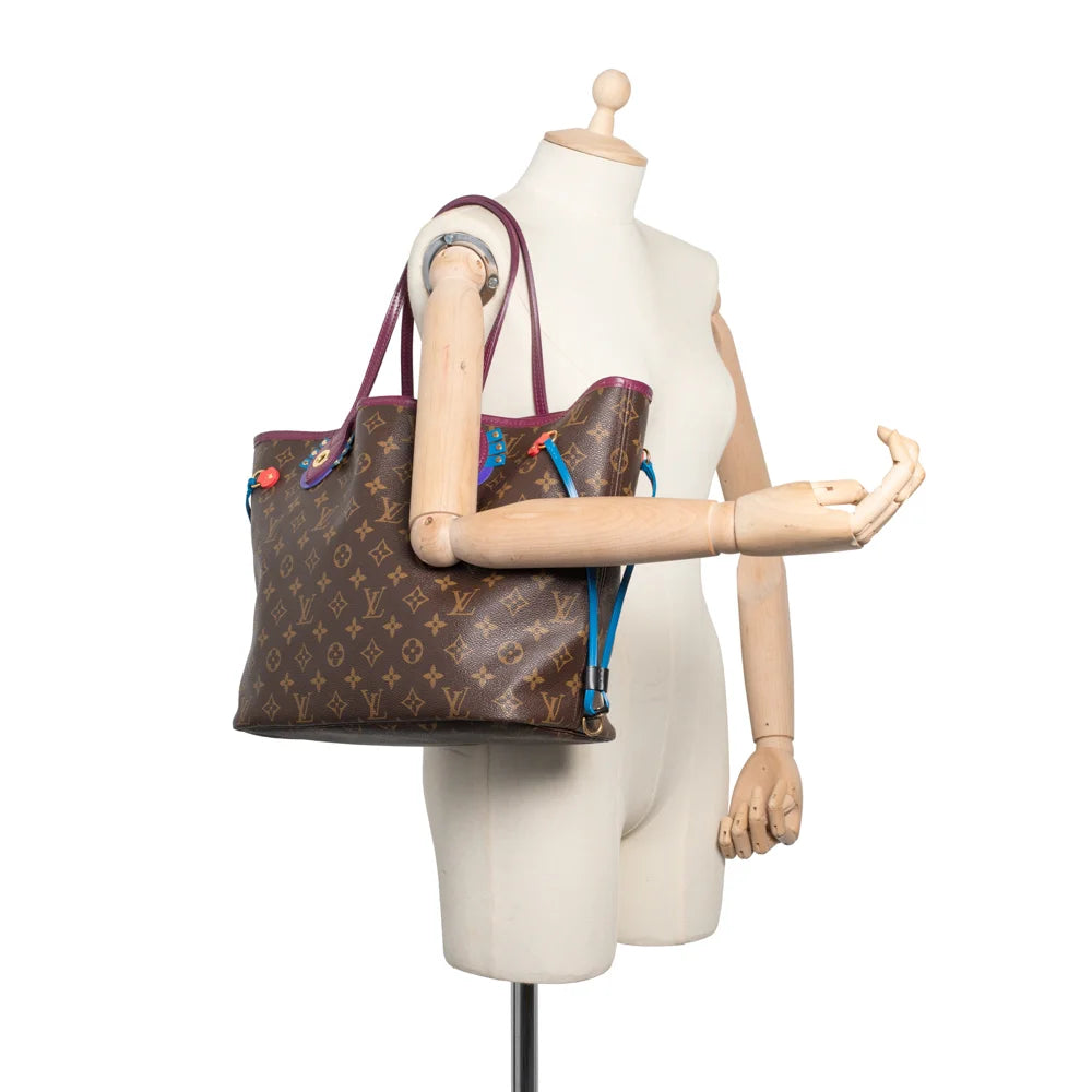 Neverfull MM Edition Totem bag in brown canvas Louis Vuitton Second Hand Used Vintega