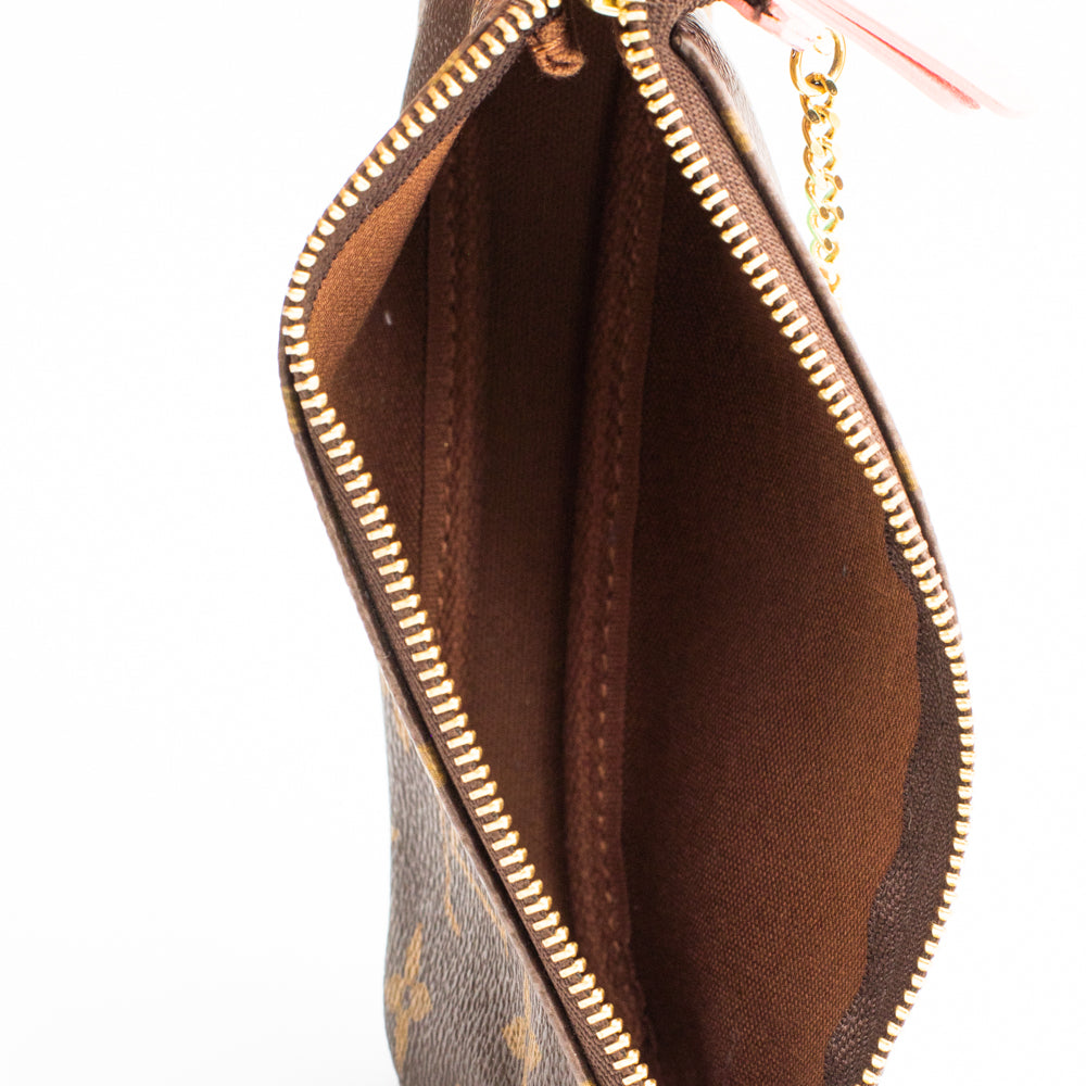 Limited Edition Accessory Pochette Bag in brown monogram canvas Louis  Vuitton - Second Hand / Used – Vintega