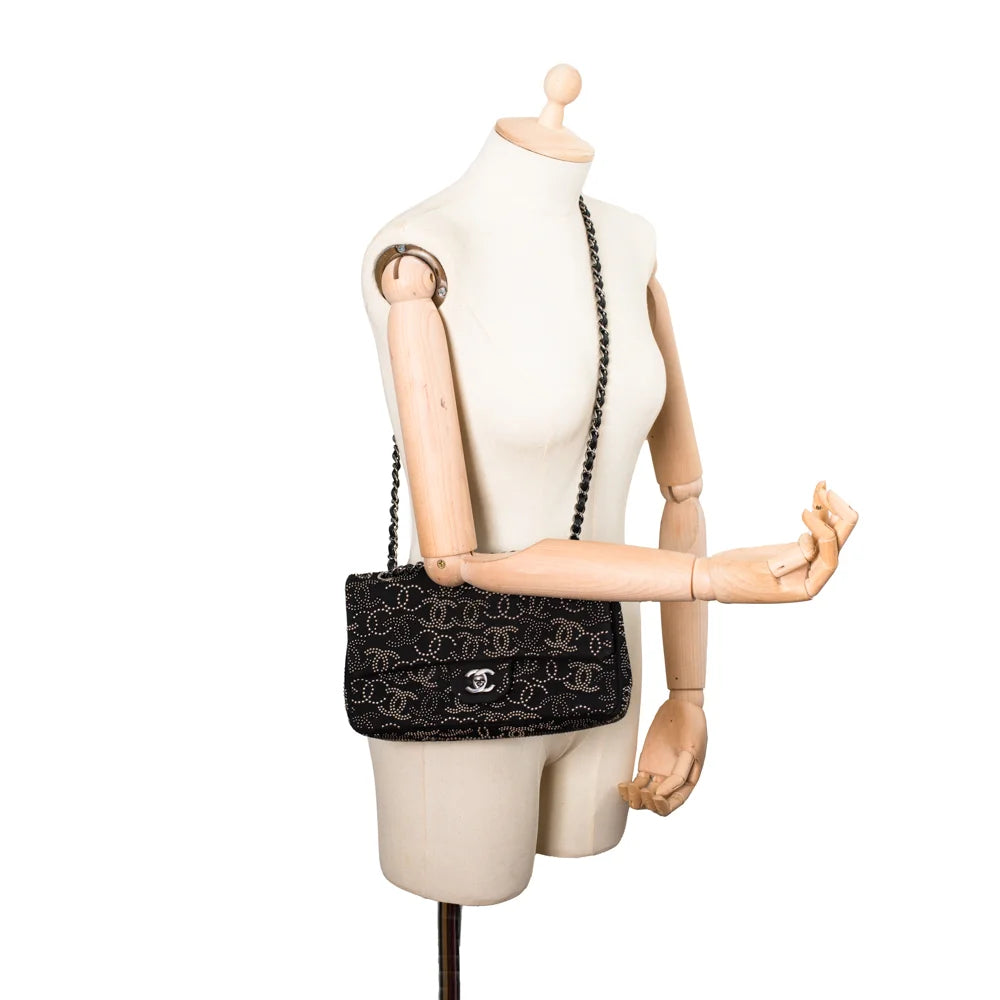 Chanel Timeless Classic Medium Limited Edition bag in black canvas Second Hand Used Vintega