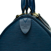 LOUIS VUITTON Sac Speedy 25 en cuir épi bleu – Intérieur…