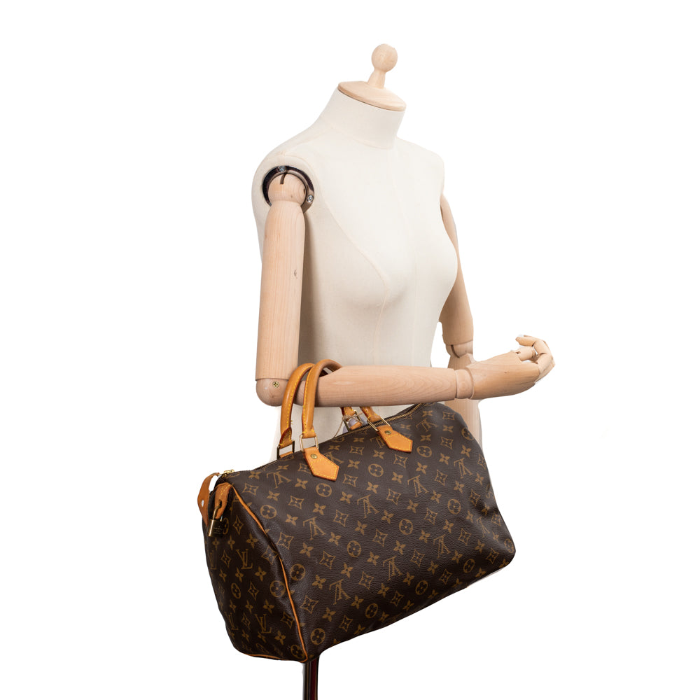 Preloved Louis Vuitton Speedy 35 Monogram Bag SP0975 022223 – KimmieBBags  LLC
